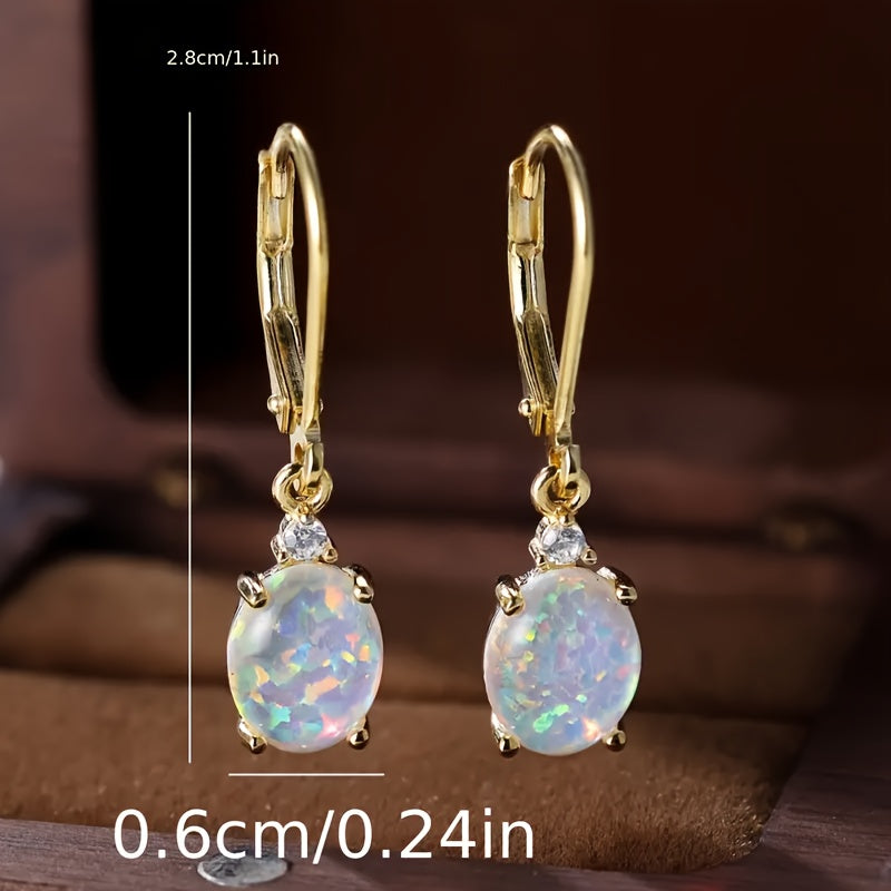 opal-studded sterling silver swing earrings