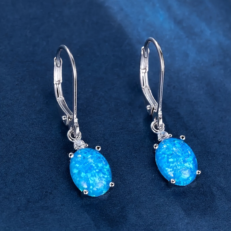 opal-studded sterling silver swing earrings