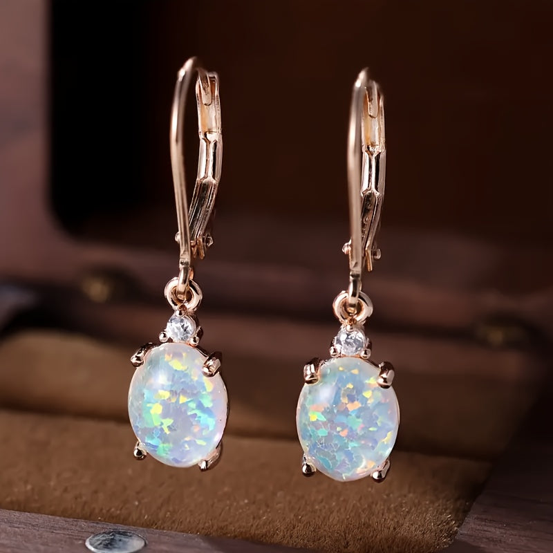 opal-studded sterling silver swing earrings