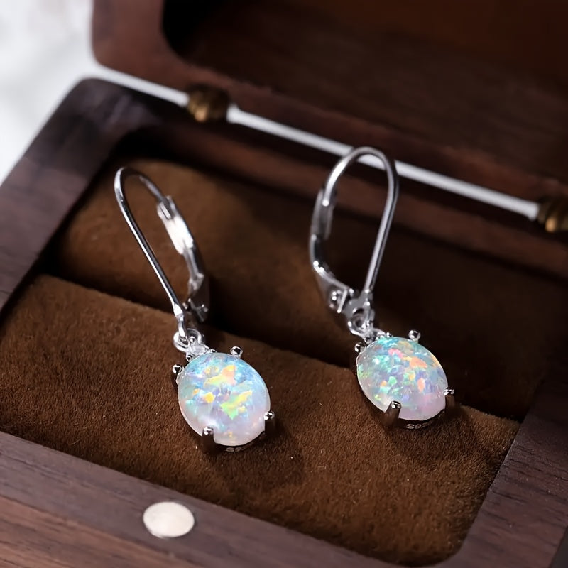 opal-studded sterling silver swing earrings