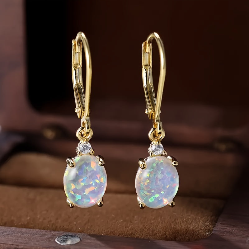 opal-studded sterling silver swing earrings